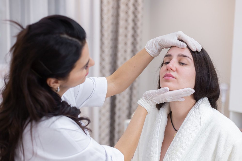 Clinician discussing non-surgical treatment options with a patient